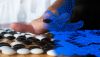 "Go" is an ancient Chinese board game where the object is to surround as much territory as possible. The game has come to be considered far harder than chess.