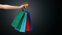 Wherever they shop, Americans go with ready credit. Will they stick to their budgets or fall into spending traps?