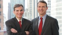 $33.45 billion-assets Signature Bank's CEO Joe DePaolo, left., and Scott Shay, chairman, r., perfect "team liftouts," to the chagrin of big New York City banks. Some analysts call this "the Signature Model."