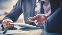 Representative of new regime begins process of reexamination of CFPB's practices, while representative of old regime seeks to regain appointment as acting director.