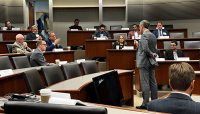 Stu Bradley addresses a question asked by an executive at the Federal Reserve Bank of Chicago