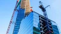 Construction sites, rife with risks from collapsing cranes to window blowouts, pose a challenge for lenders. But borrowers' insurance policies may provide some protection.