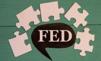 Fed Faces Difficult Decision on Rate Hikes, Say Economists